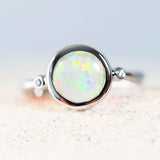 multi-colour crystal opal ring set in white gold with two white shoulder-set diamonds