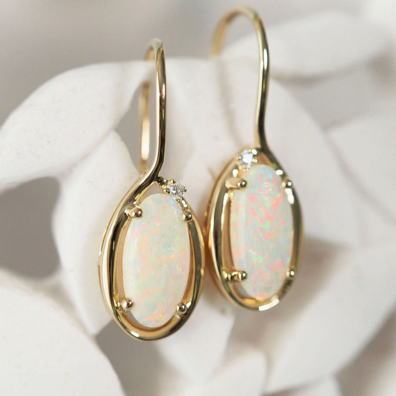 colourful long-oval australian opal earrings set in gold with diamonds