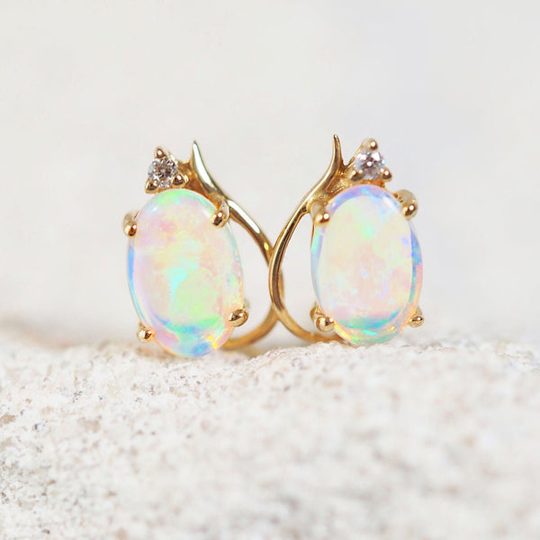 crystal opal earrings set in gold