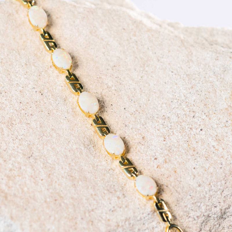 white opal bracelet set in gold plated silver