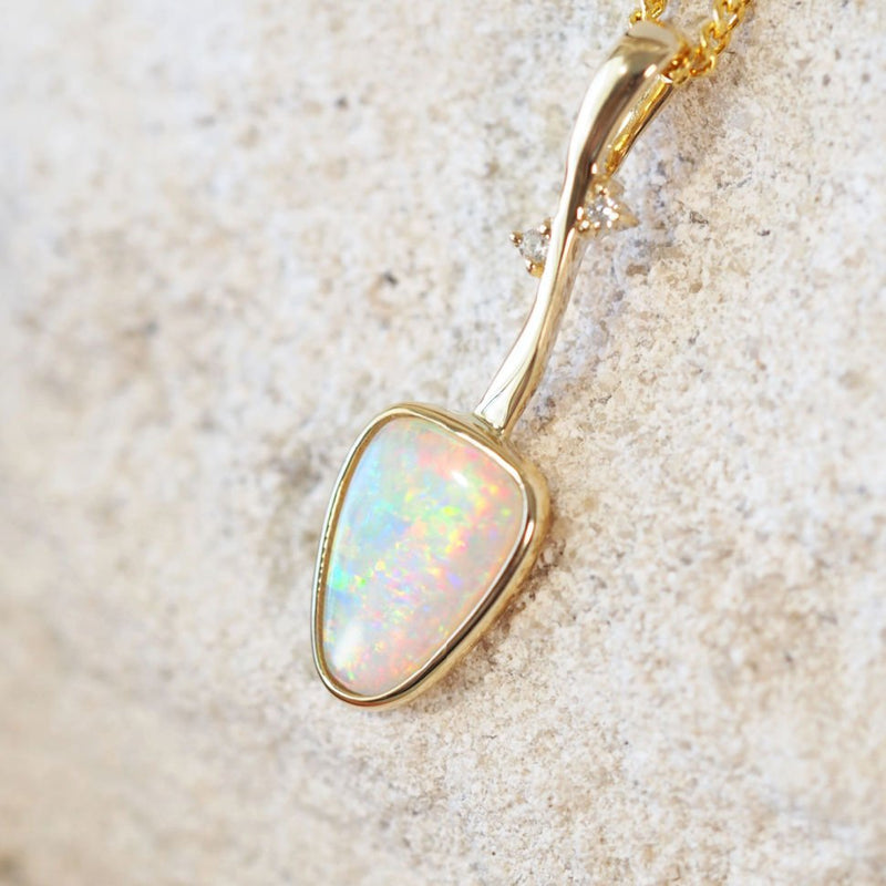 colourful crystal opal gold pendant with two diamonds