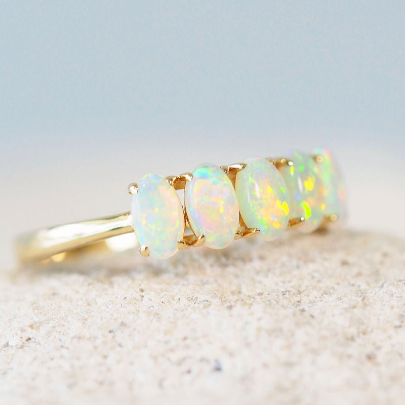 colourful Australian crystal opal gold ring featuring five solid opals