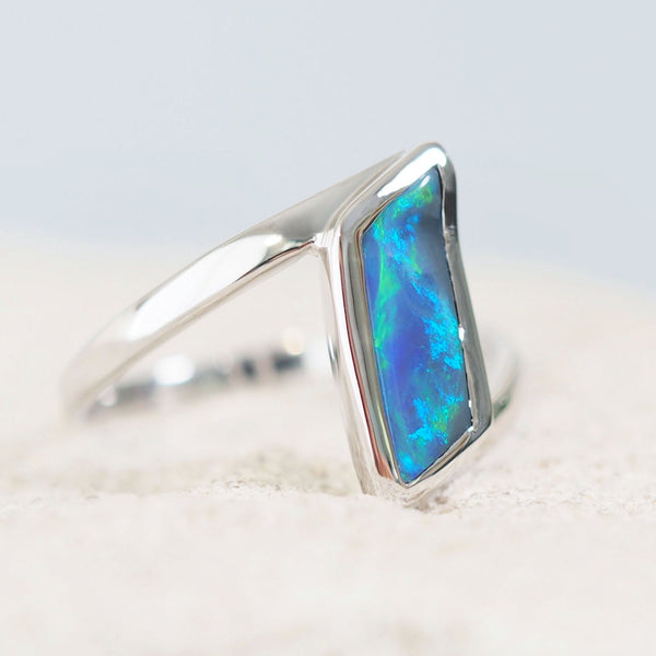 blue and green black opal white gold ring
