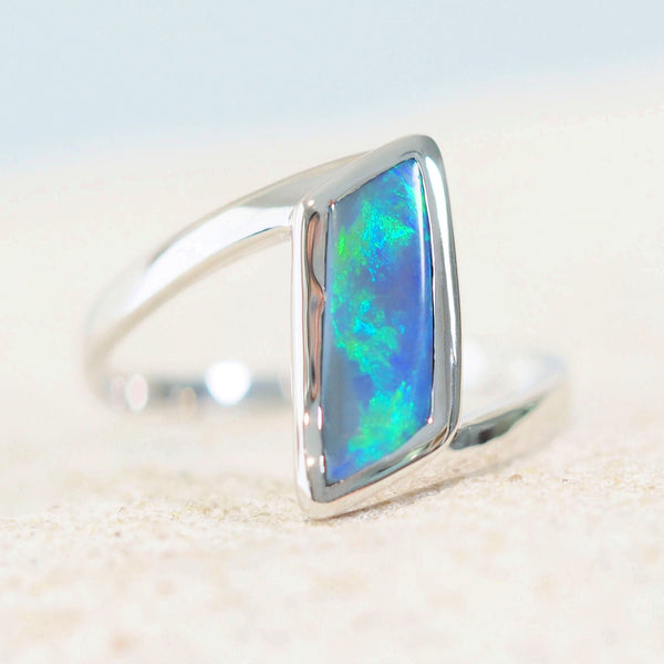 green and blue black opal ring in white gold