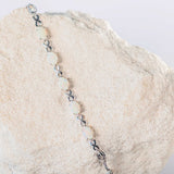colourful white opal bracelet set in sterling silver eternity design