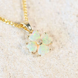 crystal opal gold pendant set with green heart shaped crystal opals