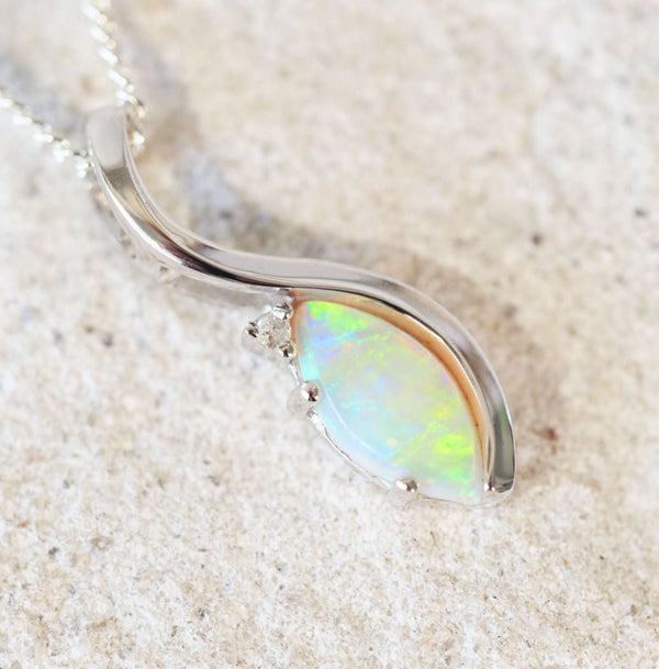 green crystal opal pendant set in white gold