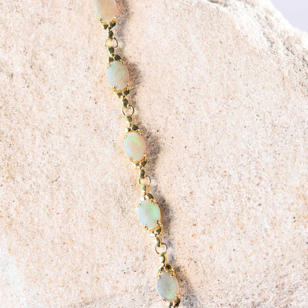 daisy chain white opal bracelet set in gold plated silver