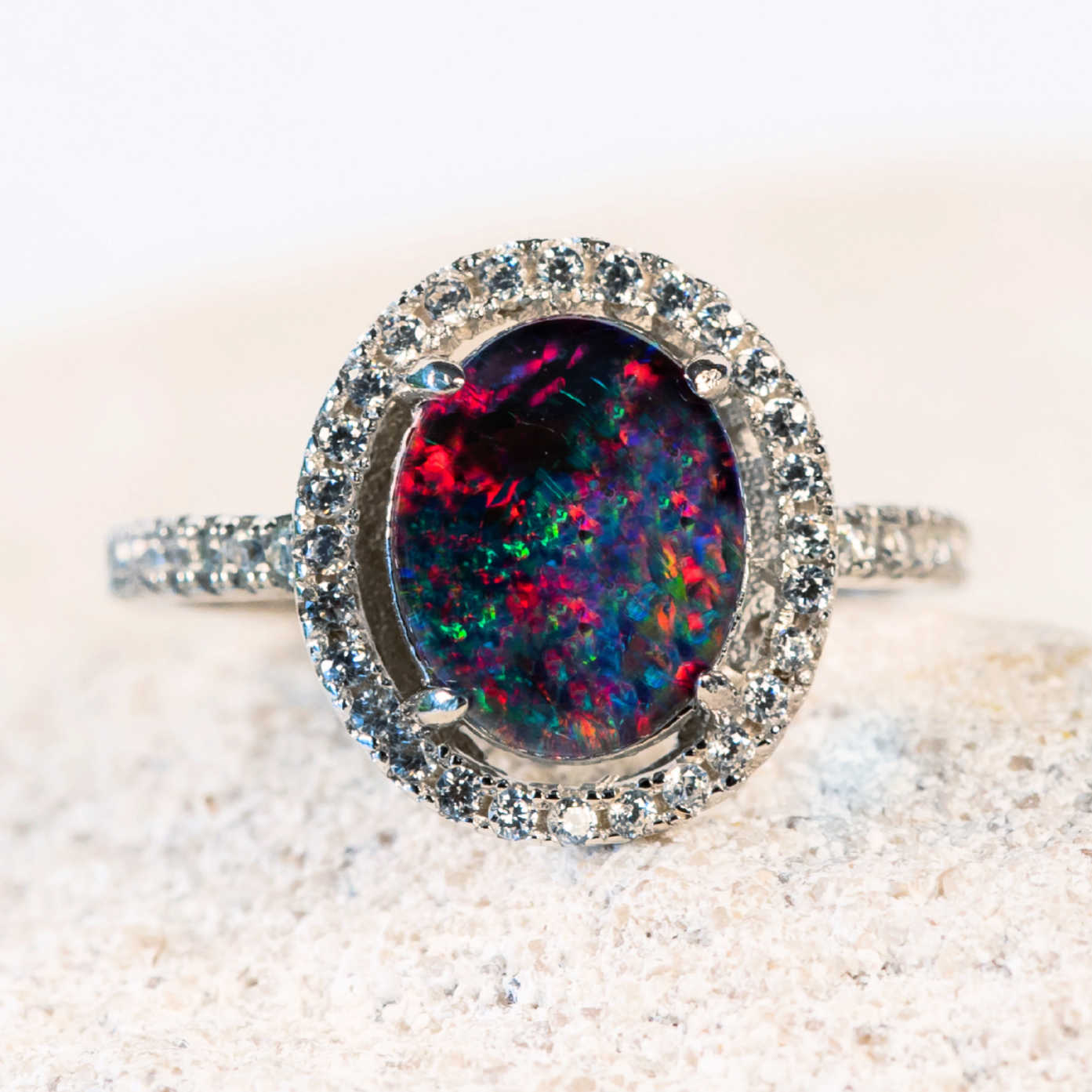 colourful australian opal ring set with a beautiful triplet opal and 42 sparkling crystals