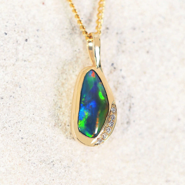 multi-coloured lightning ridge black opal gold pendant