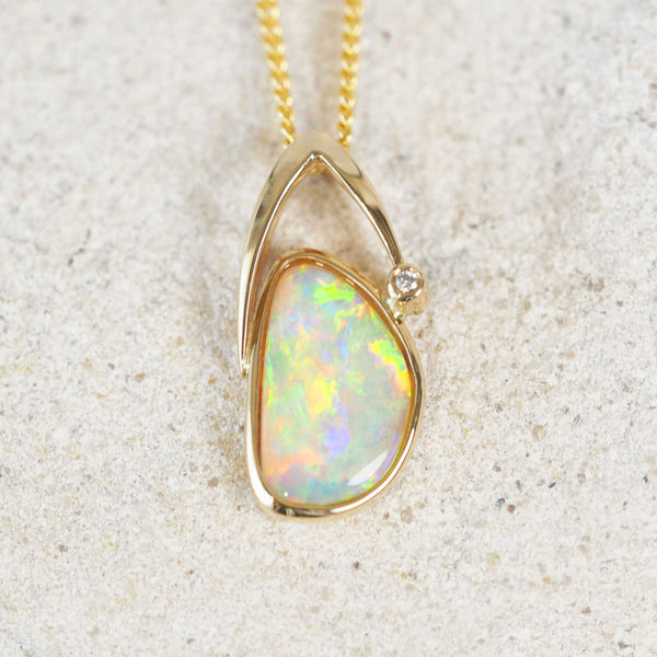 crystal opal gold pendant