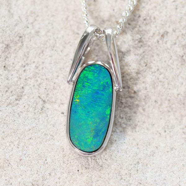 green and blue doublet opal pendant with red flash in silver