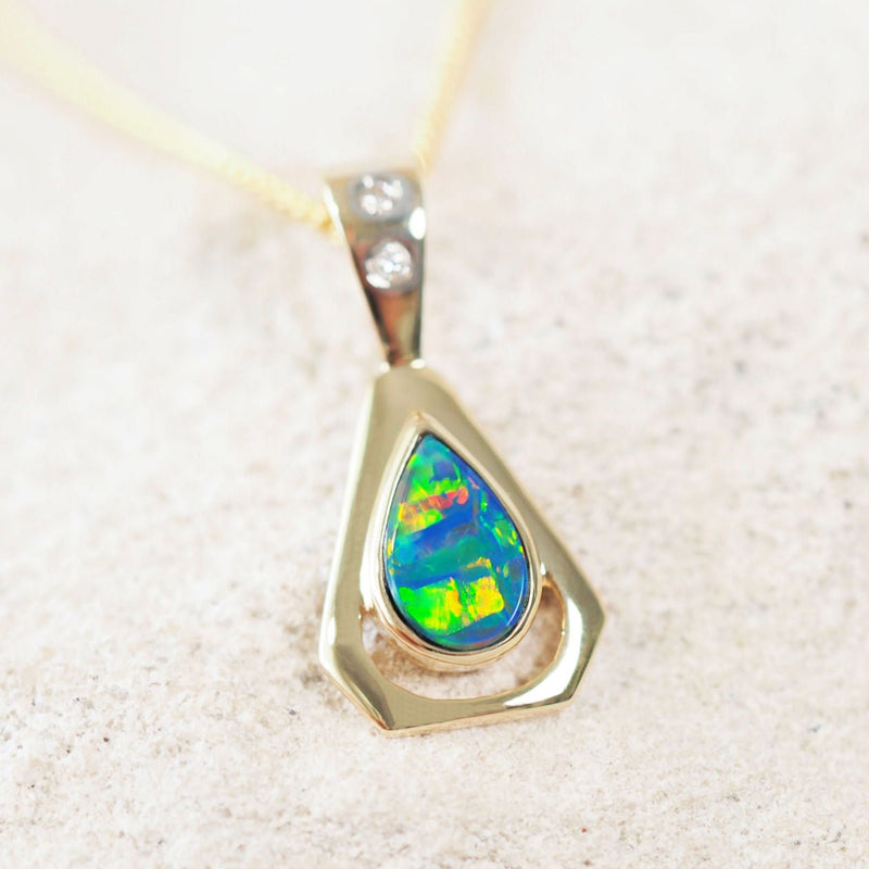 colourful doublet opal gold pendant with two diamonds