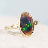 lightning ridge black opal gold ring with multi-colour flashes