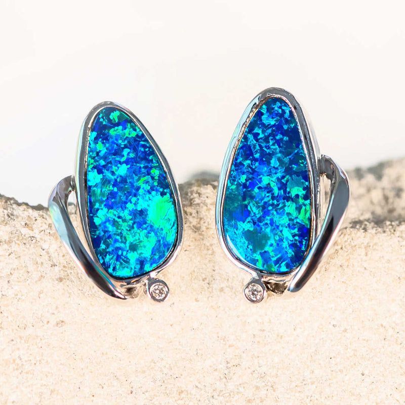 blue and green Australian opal earrings in white gold