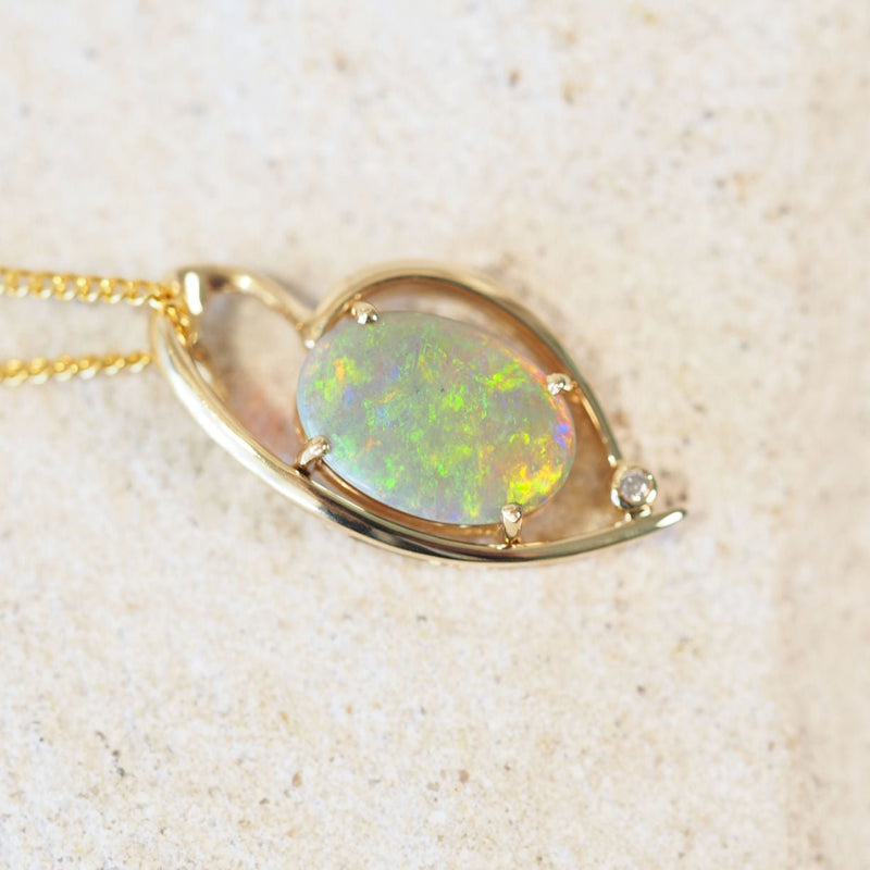 multi-colour dark crystal opal 14ct gold pendant