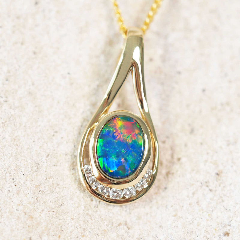 multi-colour doublet opal gold pendant with seven diamonds