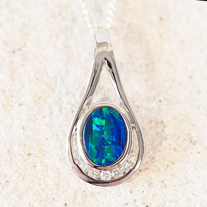green and blue doublet opal pendant in white gold
