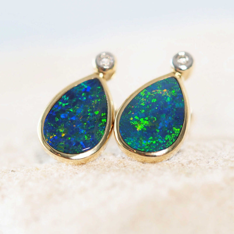 green and blue australian opal earrings with orange flashes and two diamonds
