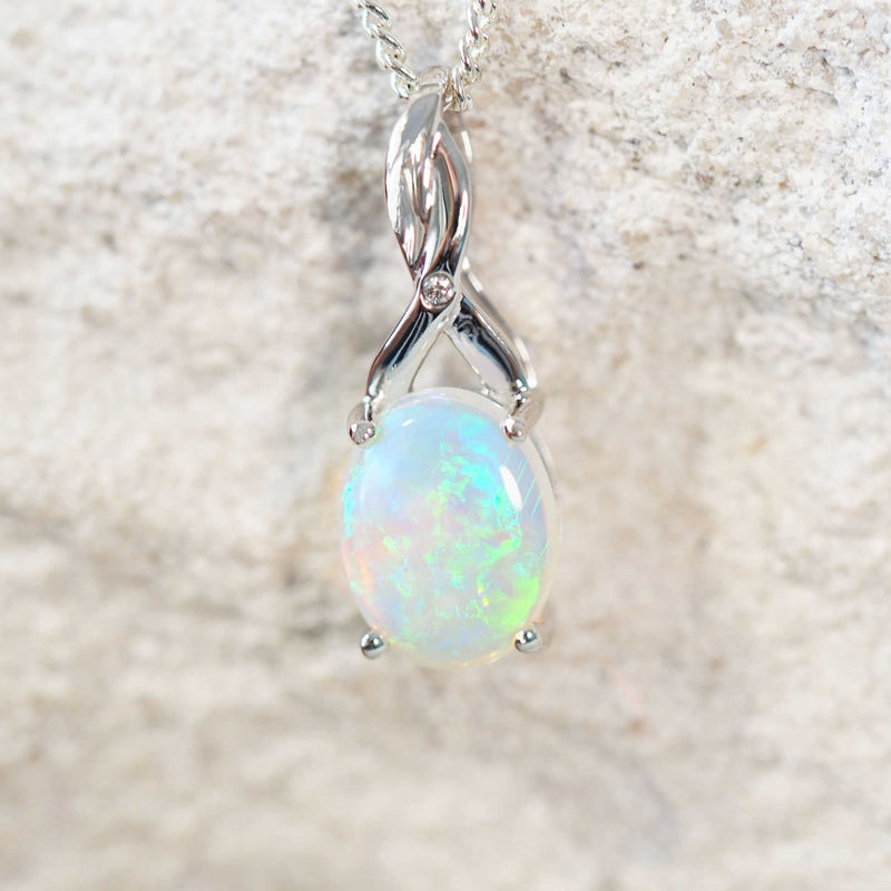 blue and green crystal opal white gold pendant