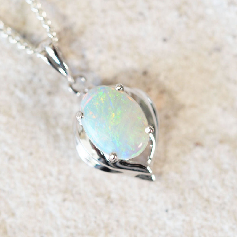 green crystal opal set in white gold pendant