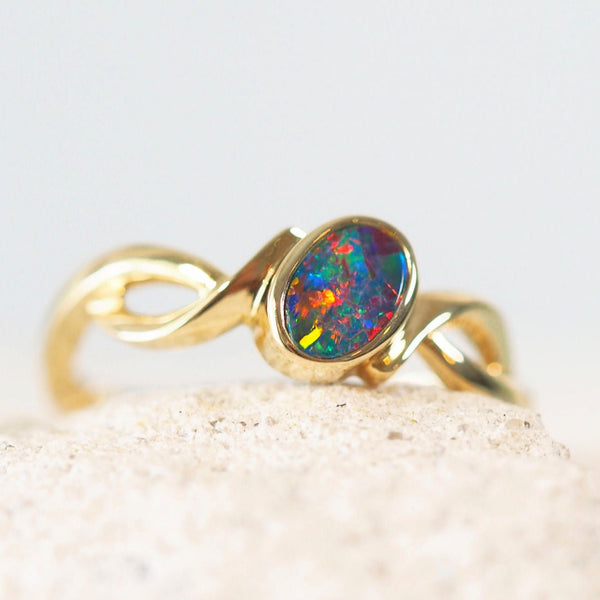 australian opal gold ring set with a colourful doublet opal ring