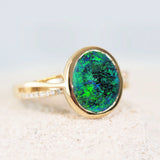 black opal gold ring with a green and blue Lightning Ridge solid opal