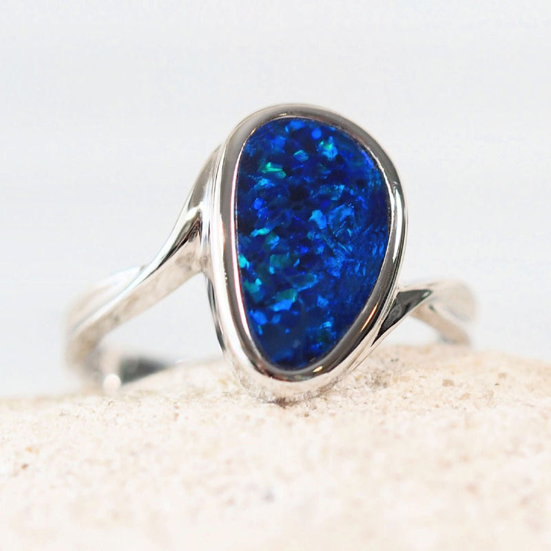 white gold australian opal ring set with a beautiful blue doublet opal
