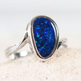 pear shaped opal white gold ring set with a beautiful blue doublet opal