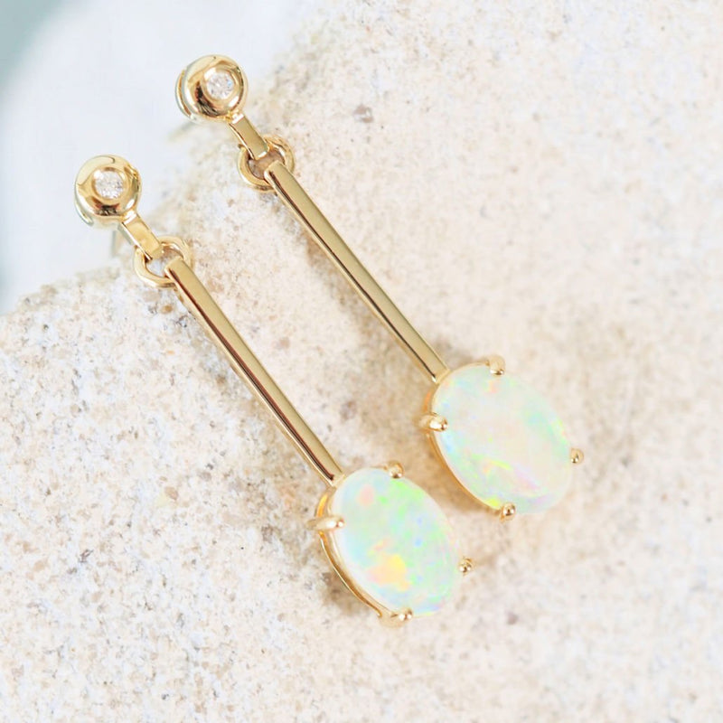 crystal opal earrings set in 14ct yellow gold