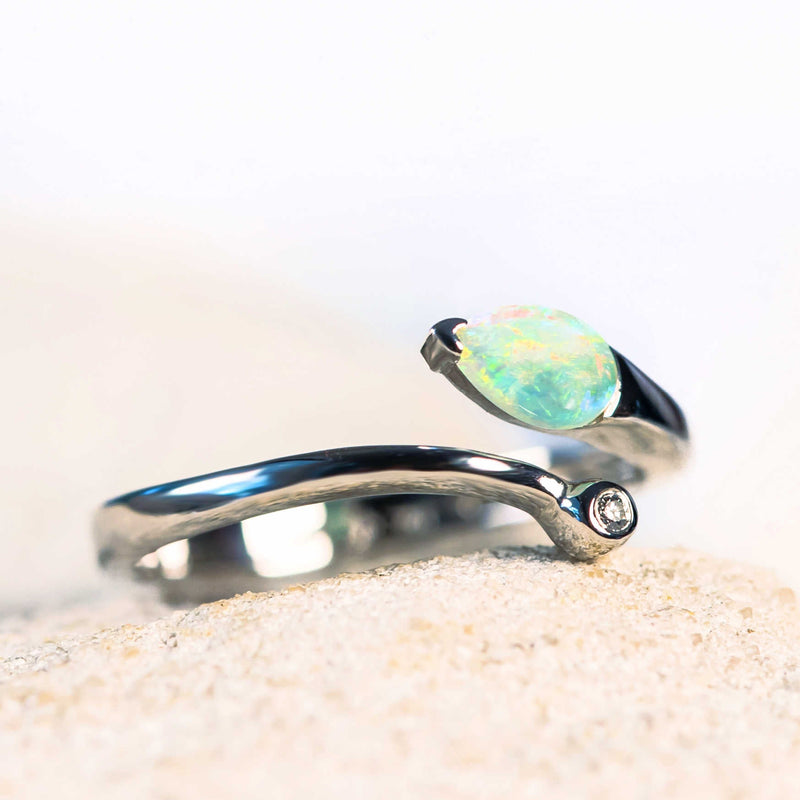 opal ring with a crystal opal and diamond