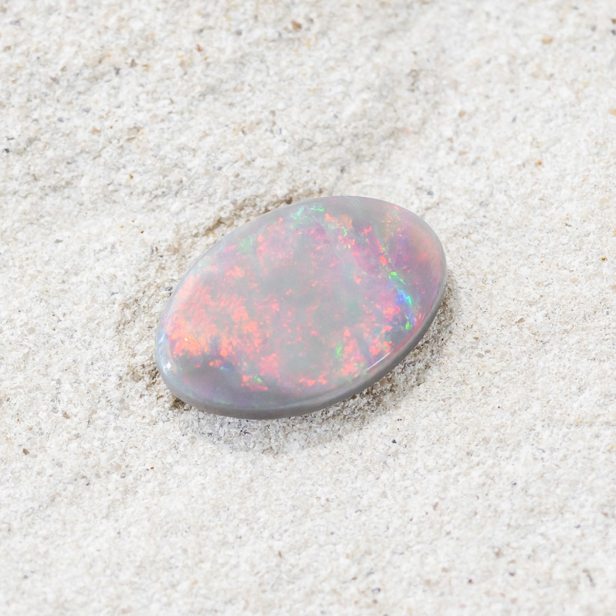 Ethically sourced Lightning Ridge opal with vivid play-of-colour