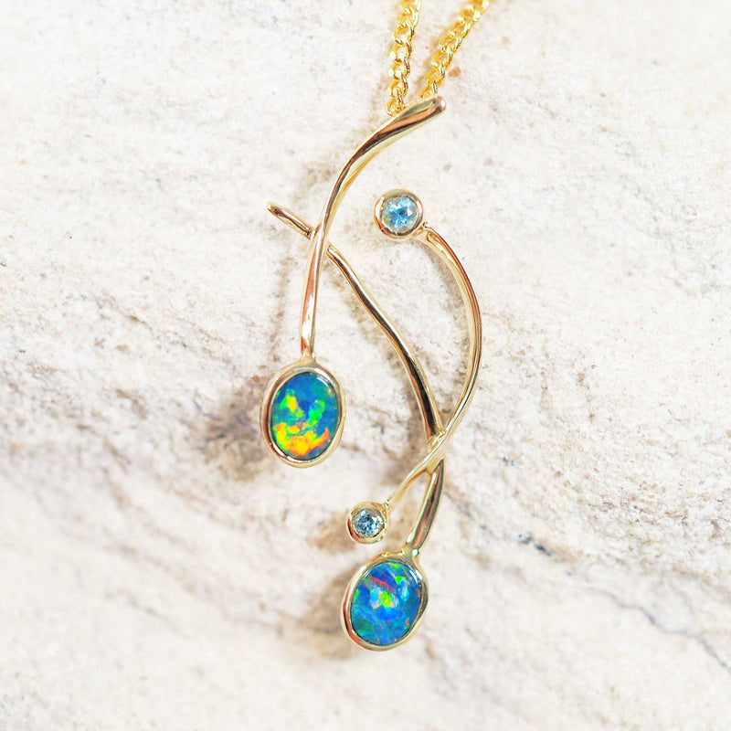 unique multi-coloured doublet opal and blue topaz gold pendant