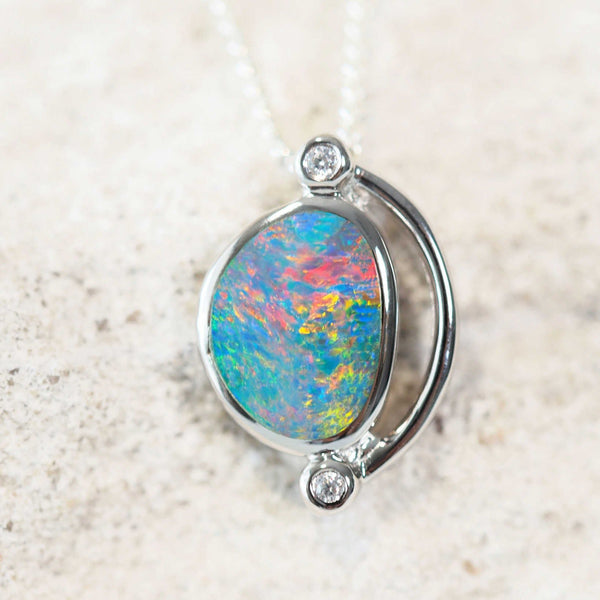 colourful australian opal silver pendant with two sparkling crystals